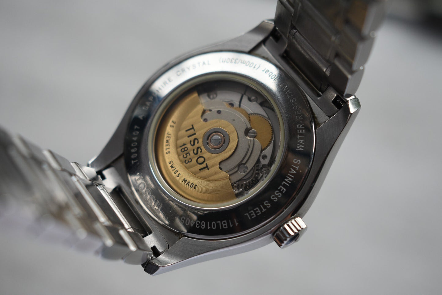 Tissot Grey Dial Automatic Men's Steel Bracelet Watch Display Caseback